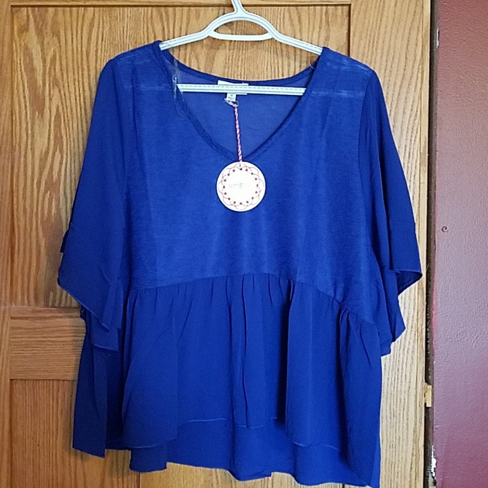 Adorable blue flare half sleeved top by Umgee.
